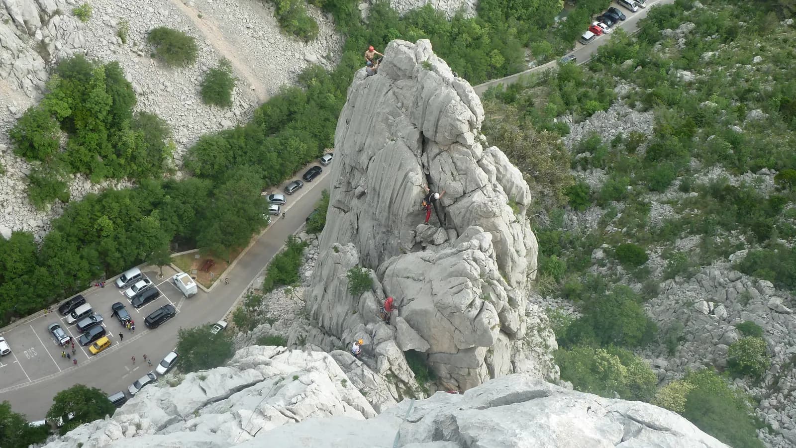 Rock climbers on limestone cliffs in Paklenica National Park Croatia